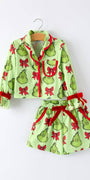 Children's pajama set with Grinch print on a white background