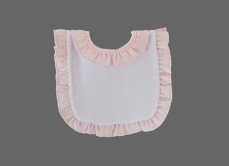 A light pink and white baby bib with ruffled trim, shown flat against a solid gray background.
