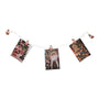 String of Christmas cards with Santa Claus images on a white background
