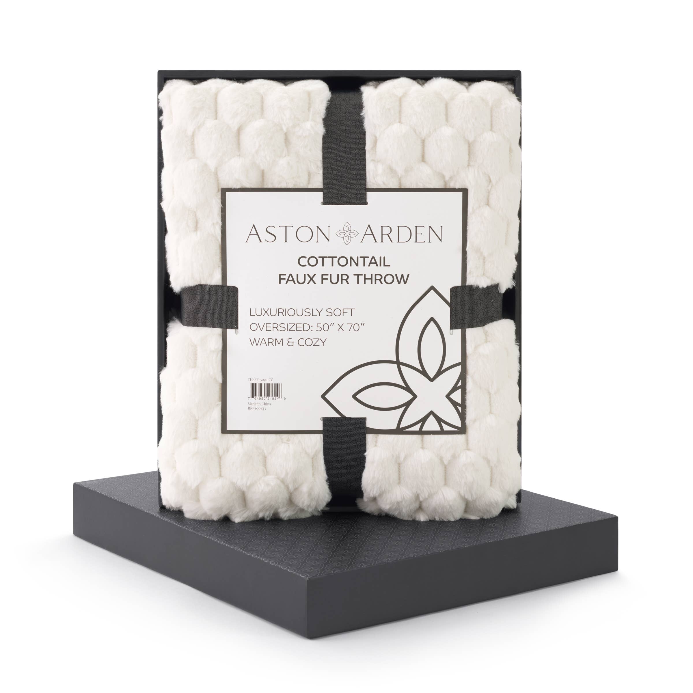 Aston Arden Cottontail faux fur throw in packaging on a white background