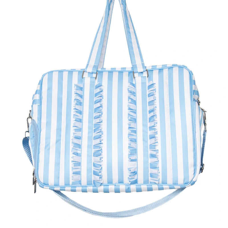 Blue and white striped bag with ruffled details on a white background