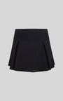 Black pleated skirt on a light gray background