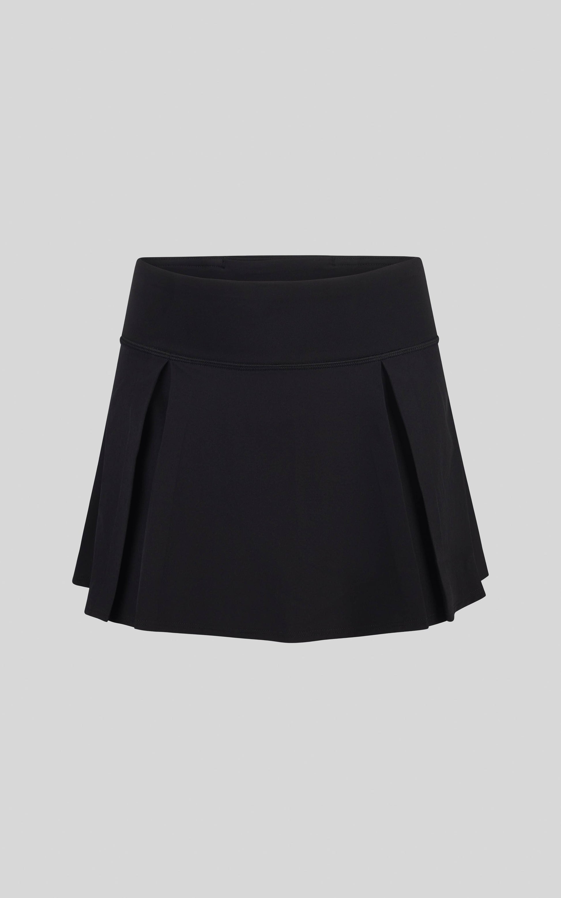 Black pleated skirt on a light gray background