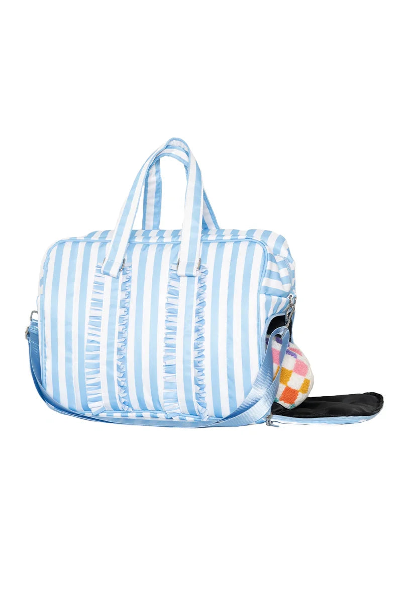 Blue and white striped bag with a colorful interior on a white background