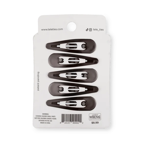 Packaging of black hair clips with branding and product details on a white background
