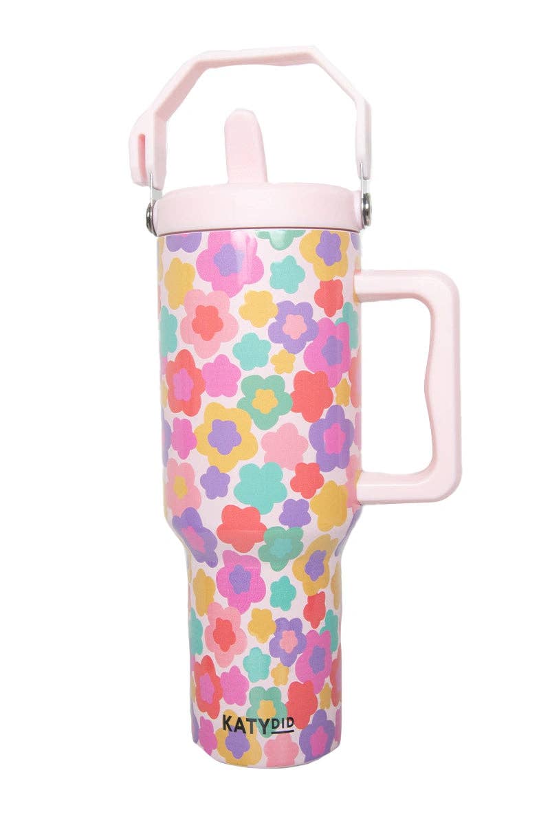 Colorful floral-patterned water bottle with pink handle on a white background