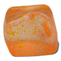 Orange and white swirled soap bar with glitter on a white background