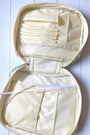 Open Bible cover lining with elastic bands and zipper pockets