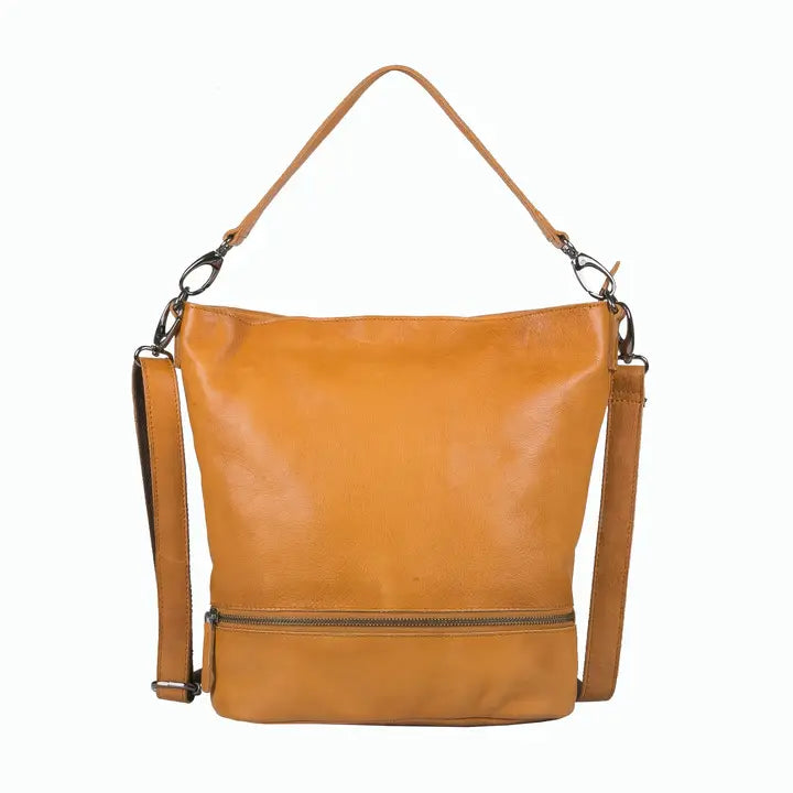 Brown leather handbag with a shoulder strap on a white background