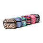 Set of colorful cosmetic bags with various patterns on a white background