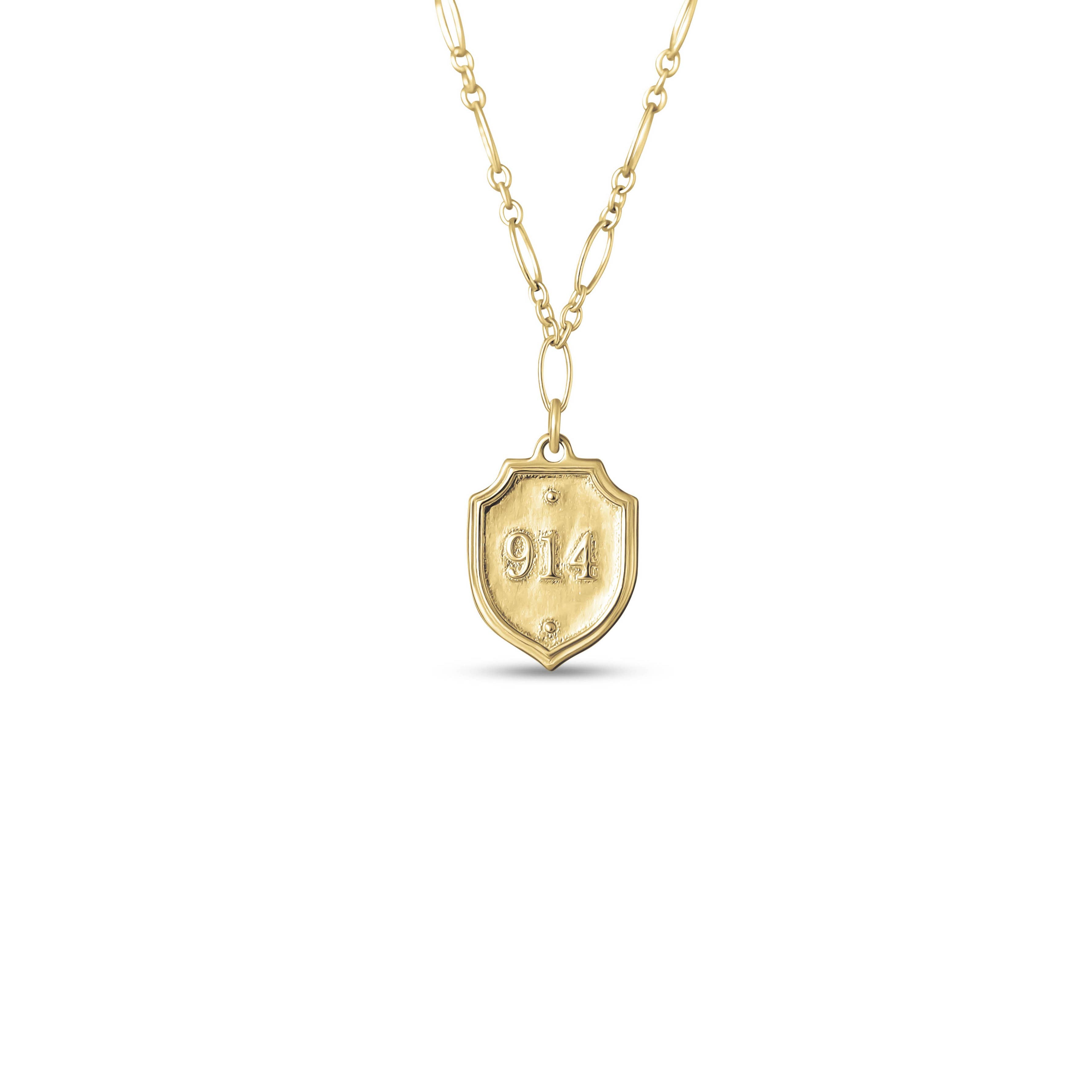 Gold necklace with a shield-shaped pendant displaying the number '914' on a white background