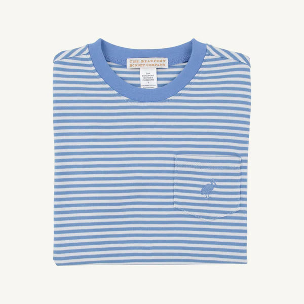 Folded blue and white striped shirt with a small logo on a light gray background