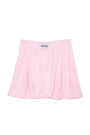 Pink skirt with a brand label on a white background