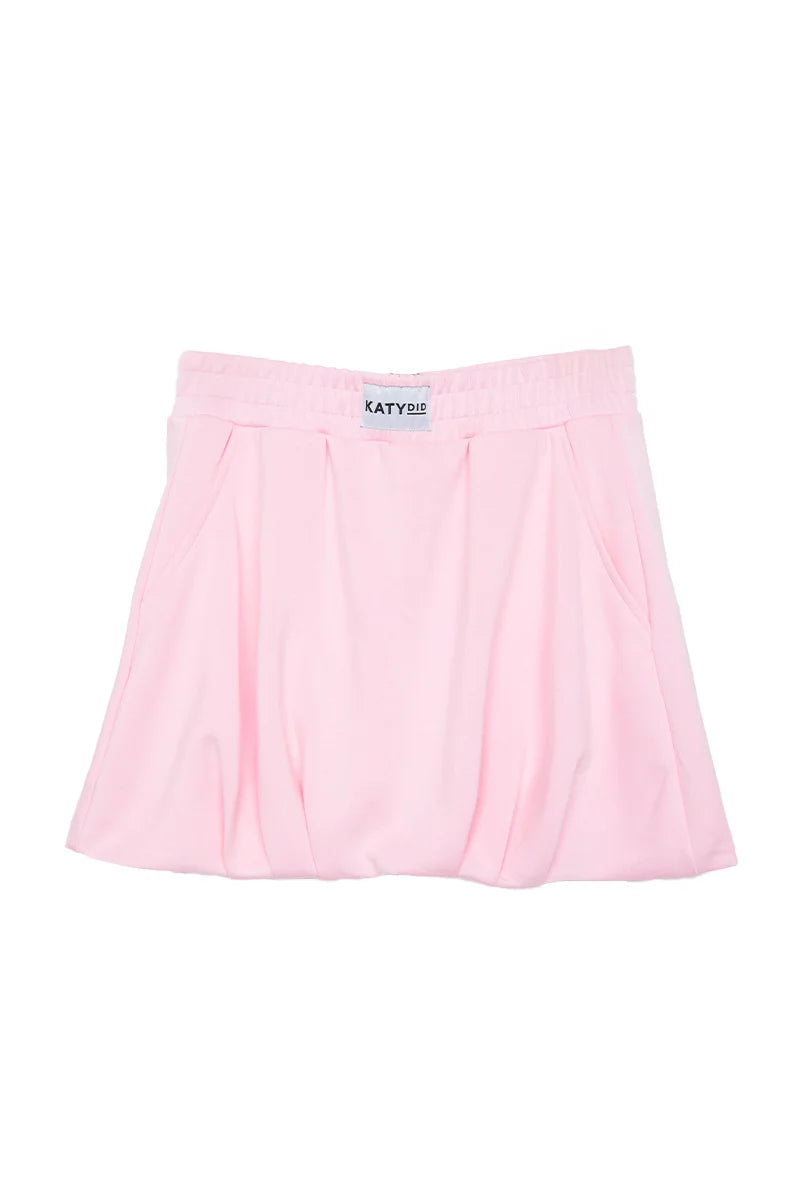 Pink skirt with a brand label on a white background
