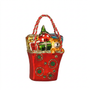 Red holiday gift bag ornament with bear figure, green tree and rope handle