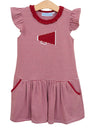 Red and white striped dress with a megaphone design on a hanger against a white background