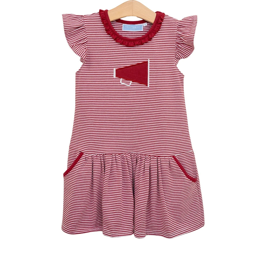 Red and white striped dress with a megaphone design on a hanger against a white background