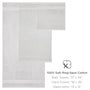 Gray bath towel with dimensions and material information on a white background