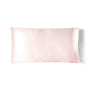 Silky pillowcase with a soft pink gradient on a white background