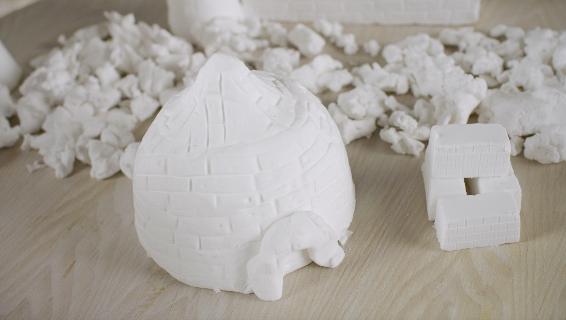 White foam blocks on a wooden surface