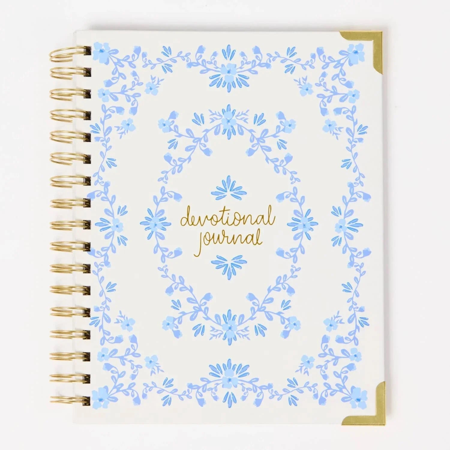 Devotional journal with blue floral design and gold text on a white background
