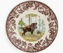 Decorative plate with a bear design in a natural setting
