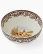 Decorative ceramic bowl with floral pattern on a white background