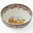 Decorative ceramic bowl with floral pattern on a white background