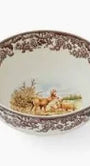Decorative ceramic bowl with floral pattern on a white background