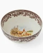 Decorative ceramic bowl with floral pattern on a white background