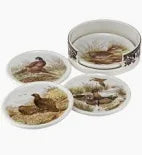 Set of ceramic bowls with nature-themed designs on a white background