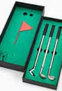 Set of golf tools with a flag in a green box