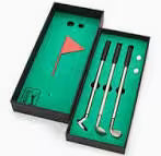 Set of golf tools with a flag in a green box
