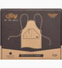 Brown leather apron with 'King of the Grill' branding on a box
