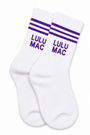 White crew socks with purple stripes and 'LULU MAC' lettering