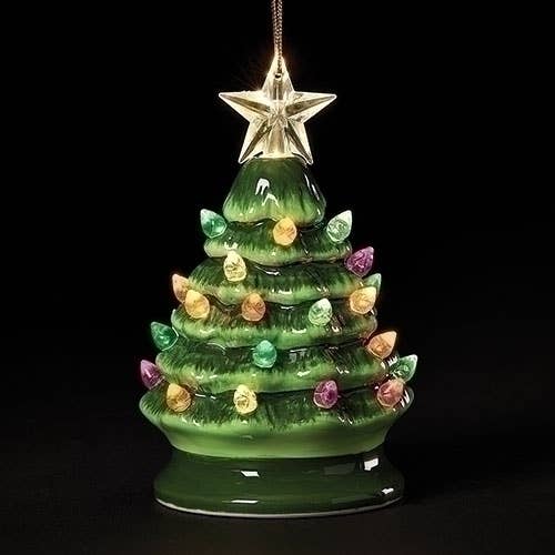 Decorative Vintage  Christmas tree ornament with colorful lights and a star on a black background