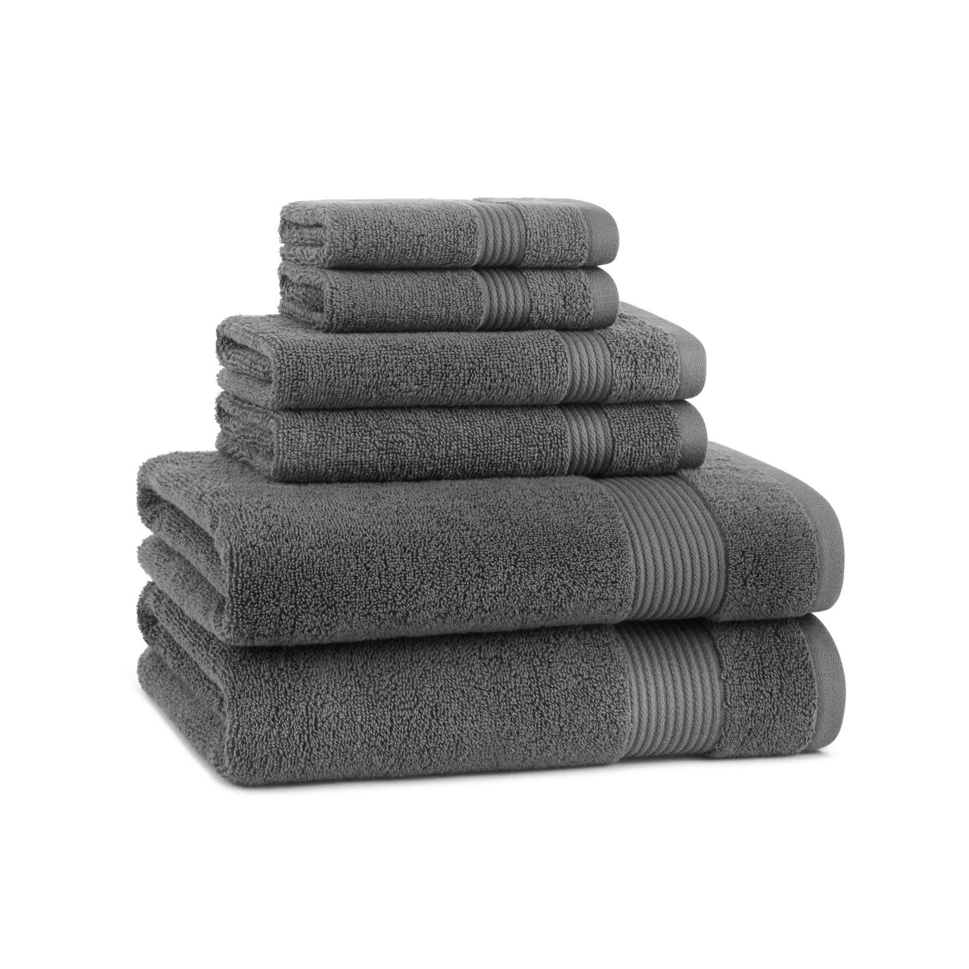 Set of gray towels stacked on a white background