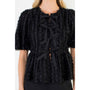 Black textured top with ribbon details on a white background