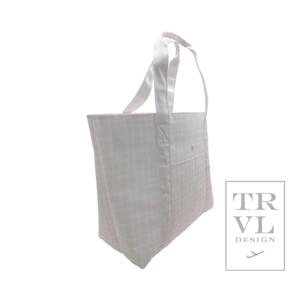 White tote bag with subtle pink design on a white background