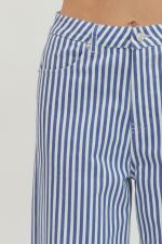 Close-up of blue and white striped pants with a focus on the waistband.
