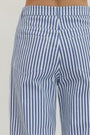 Blue and white striped pants with a close-up on the waistband.