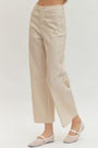 Striped pants worn by a person on a white background