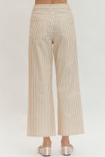 Beige striped pants worn by a person on a white background