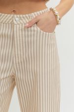Beige striped pants worn by a person with a neutral background
