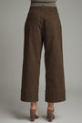 Brown wide-leg pants on a neutral background