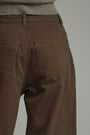 Brown pants with a plain background