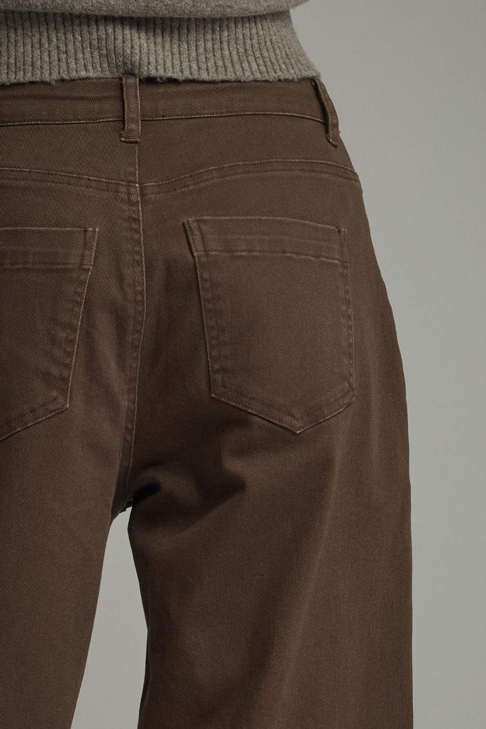 Brown pants with a plain background
