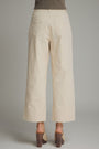 Beige wide-leg pants on a neutral background