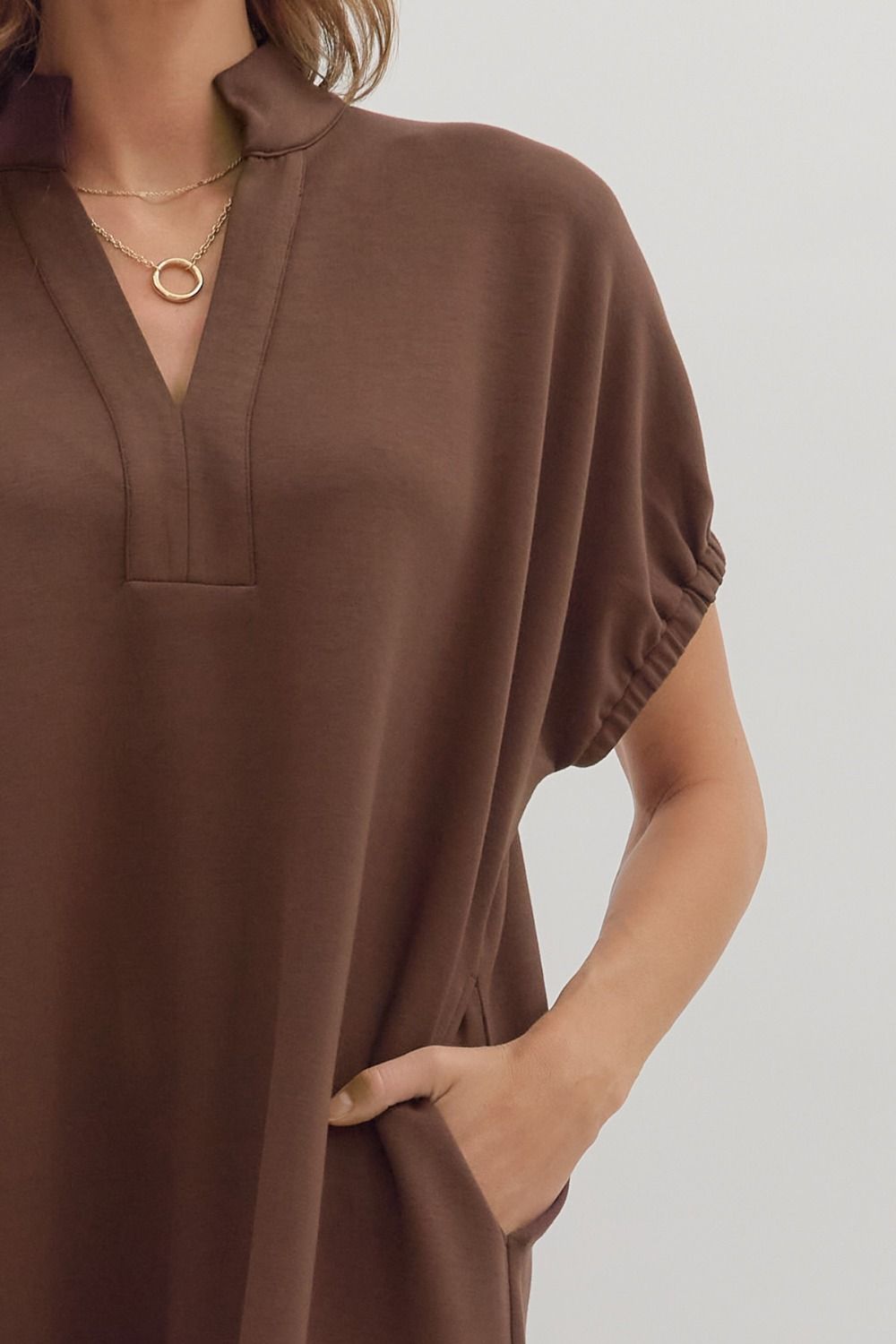 women wearing a brown short sleeve midi dress