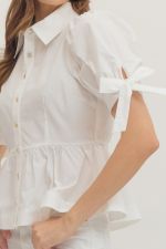 White blouse with bow sleeves on a white background